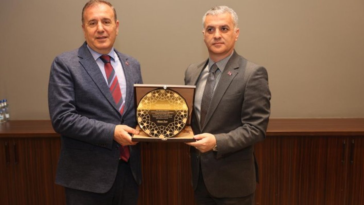 BAŞKAN BIYIK’TAN TDTM YÖNETİMİNE TEŞEKKÜR PLAKETİ